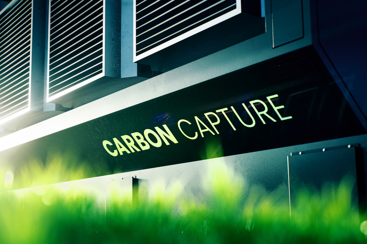 3D rendering of a carbon capture device in a green landscape