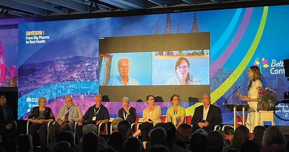 Veronika Kyrylenko (at the podium, far right) leads a panel discussion at the World Council for Health’s Better Way Conference in Bath, UK. The conference, co-sponsored by The New American, brought together leaders in various fields to work towards an alternative to the globalists’ post-Covid Great Reset.